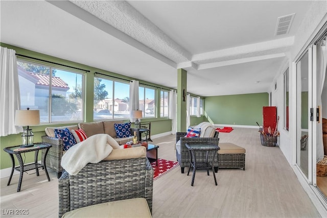 sunroom / solarium with visible vents