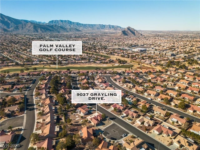 bird's eye view with a residential view and a mountain view