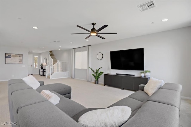 8564 Scalpay St, Las Vegas, NV 89166 - living area featuring stairway, baseboards, recessed lighting, ceiling fan, and light carpet