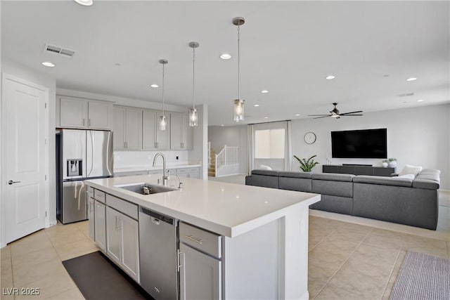 8564 Scalpay St, Las Vegas, NV 89166 - kitchen featuring appliances with stainless steel finishes, a sink, recessed lighting, gray cabinetry, and ceiling fan
