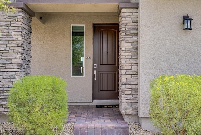 8564 Scalpay St, Las Vegas, NV 89166 - entrance to property featuring stucco siding and stone siding