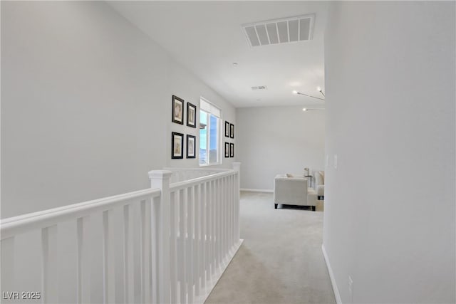 8564 Scalpay St, Las Vegas, NV 89166 - corridor featuring light carpet and baseboards