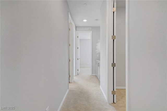 8564 Scalpay St, Las Vegas, NV 89166 - hall with light carpet, baseboards, and recessed lighting