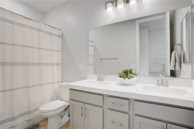 8564 Scalpay St, Las Vegas, NV 89166 - full bath with double vanity, toilet, a shower with curtain, and tile patterned floors