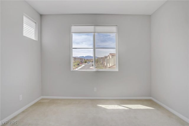 8564 Scalpay St, Las Vegas, NV 89166 - unfurnished room with light carpet and baseboards