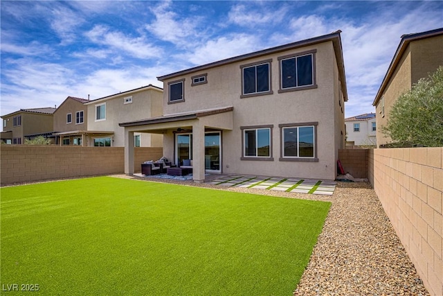 8564 Scalpay St, Las Vegas, NV 89166 - rear view of house with stucco siding, an outdoor hangout area, and a patio