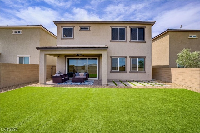 8564 Scalpay St, Las Vegas, NV 89166 - back of property with an outdoor hangout area, a ceiling fan, stucco siding, and a patio