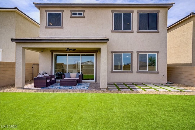 8564 Scalpay St, Las Vegas, NV 89166 - rear view of property featuring an outdoor living space, stucco siding, a ceiling fan, and a patio area