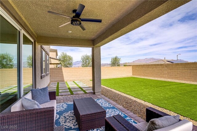 8564 Scalpay St, Las Vegas, NV 89166 - view of patio / terrace with a ceiling fan and outdoor lounge area