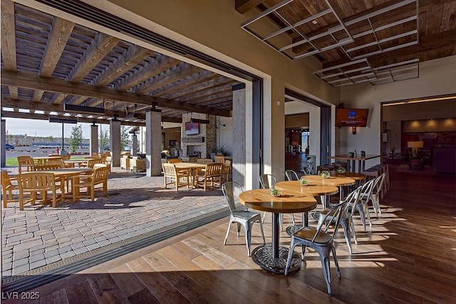 8564 Scalpay St, Las Vegas, NV 89166 - dining room with wood ceiling with exposed beams and wood-type flooring