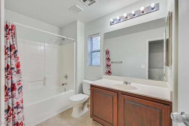 bathroom featuring toilet, visible vents, shower / tub combo, and vanity