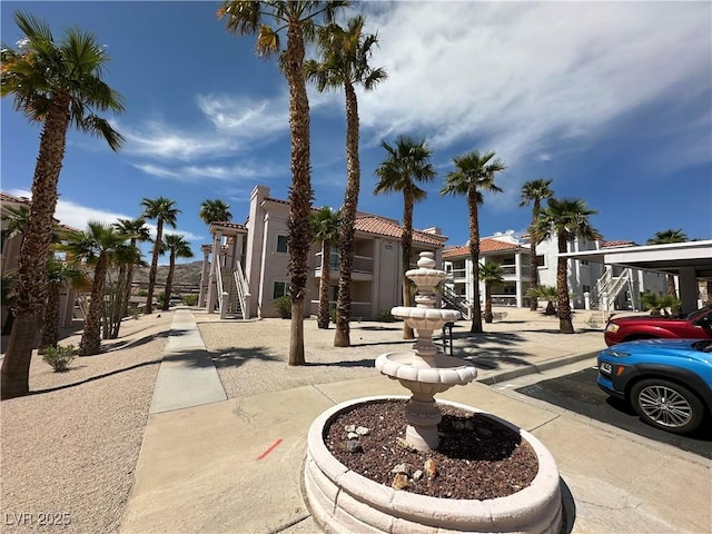 view of property's community featuring stairway