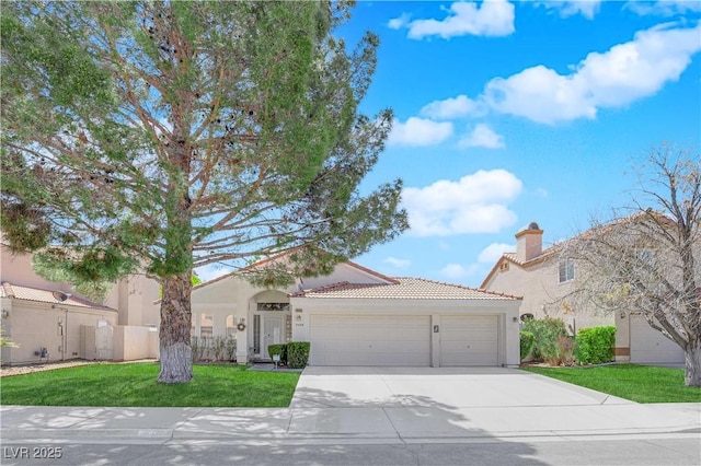 7405 Blue Sage Ct, Las Vegas, NV 89129 - mediterranean / spanish-style house featuring an attached garage, driveway, stucco siding, a tiled roof, and a front yard