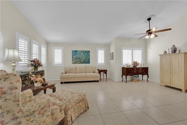 7405 Blue Sage Ct, Las Vegas, NV 89129 - living area with healthy amount of natural light, ceiling fan, and light tile patterned flooring