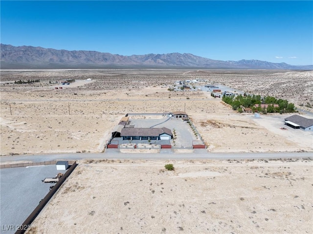aerial view with a mountain view and a desert view