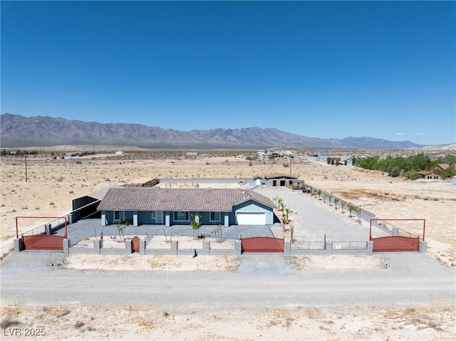 property view of mountains featuring a rural view and a desert view