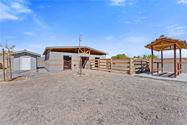 view of yard with an outbuilding and an exterior structure