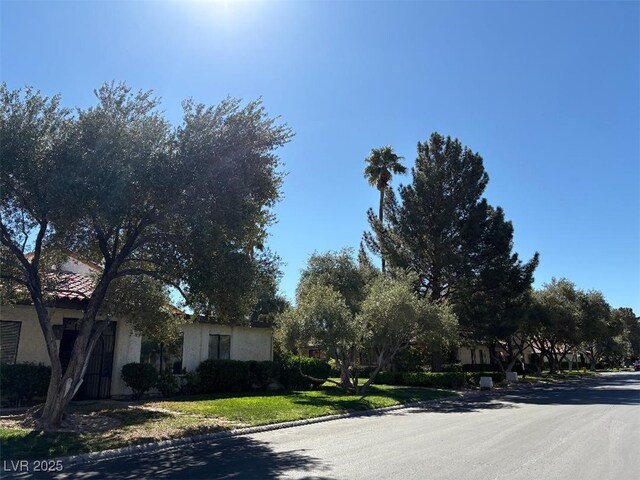 2569 Malabar Ave, Las Vegas, NV 89121 - view of asphalt street featuring curbs