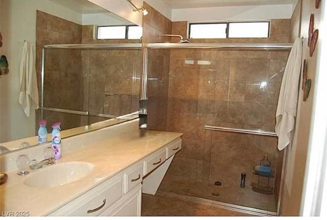 2569 Malabar Ave, Las Vegas, NV 89121 - bathroom with vanity and a shower stall