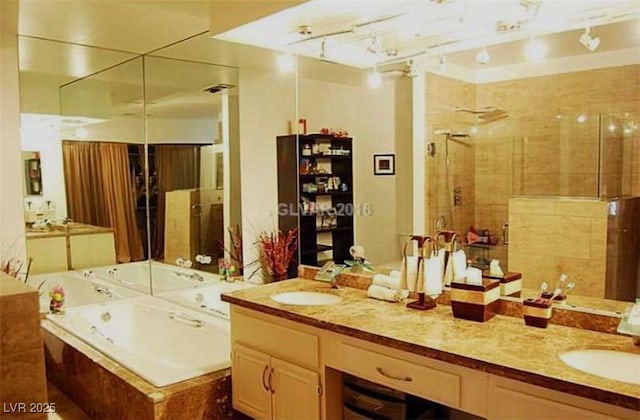 2569 Malabar Ave, Las Vegas, NV 89121 - full bath featuring double vanity, a stall shower, and a bath