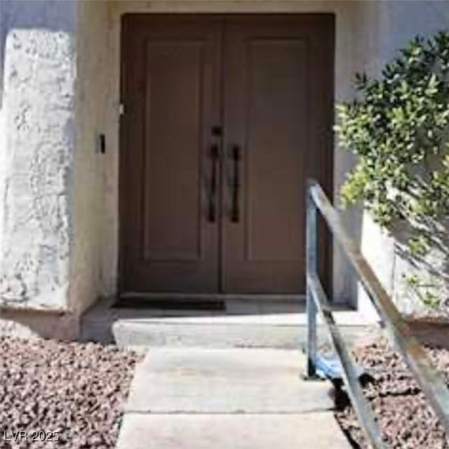 2569 Malabar Ave, Las Vegas, NV 89121 - property entrance featuring stucco siding