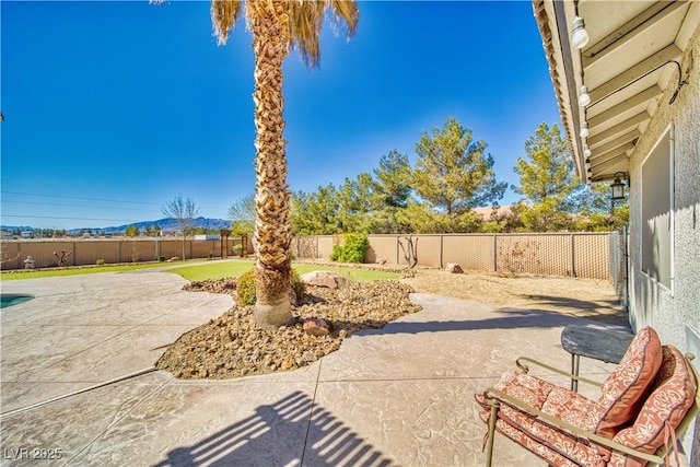view of patio / terrace with a fenced backyard