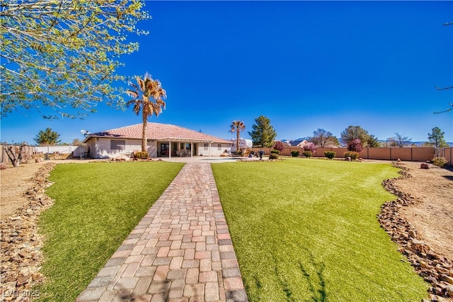 1131 China St, Pahrump, NV 89048 - view of yard featuring a patio