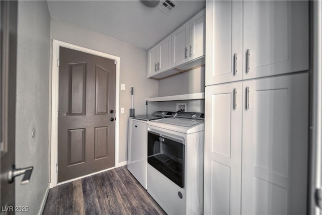 1131 China St, Pahrump, NV 89048 - washroom with independent washer and dryer, cabinet space, baseboards, and dark wood-style flooring