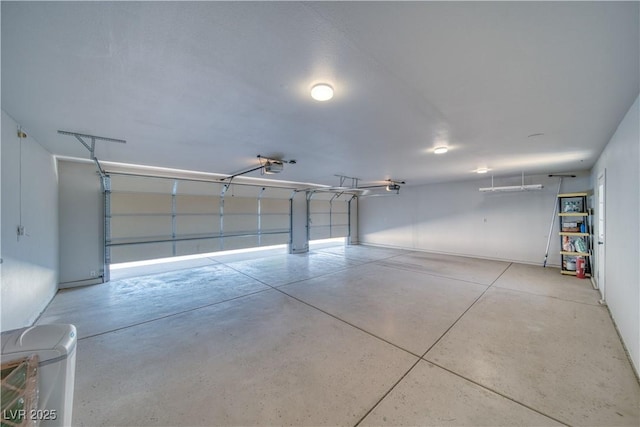 1131 China St, Pahrump, NV 89048 - garage featuring a garage door opener and baseboards