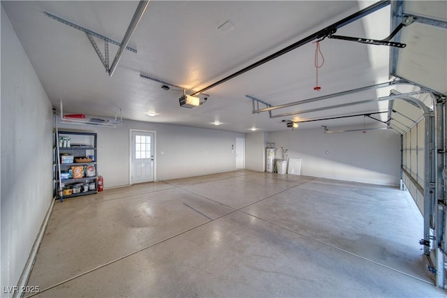 1131 China St, Pahrump, NV 89048 - garage featuring a garage door opener and baseboards