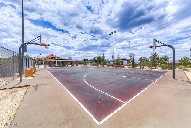 view of sport court featuring community basketball court and fence