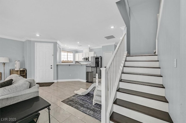 3920 Sweet Pine St Unit 102, Las Vegas, NV 89108 - living room with ornamental molding, stairs, recessed lighting, light tile patterned floors, and baseboards