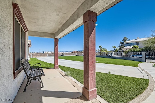 8515 Belcastro St, Las Vegas, NV 89113 - view of patio / terrace featuring a residential view
