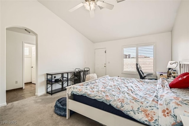 8515 Belcastro St, Las Vegas, NV 89113 - bedroom featuring vaulted ceiling, arched walkways, carpet floors, baseboards, and a ceiling fan