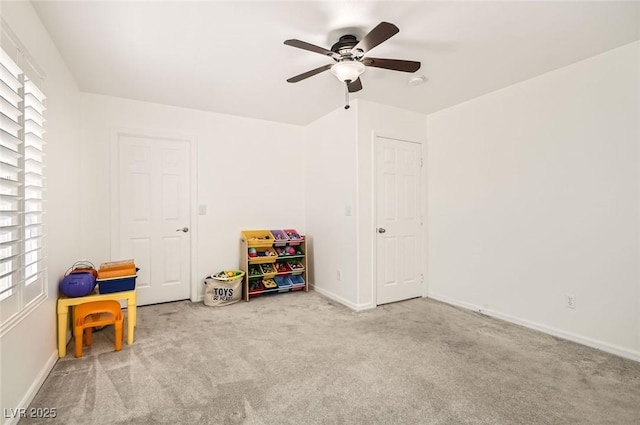 8515 Belcastro St, Las Vegas, NV 89113 - game room with carpet floors, healthy amount of natural light, ceiling fan, and baseboards