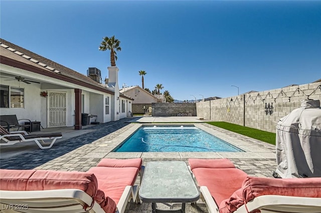8515 Belcastro St, Las Vegas, NV 89113 - view of pool featuring a fenced backyard, grilling area, a patio, and ceiling fan
