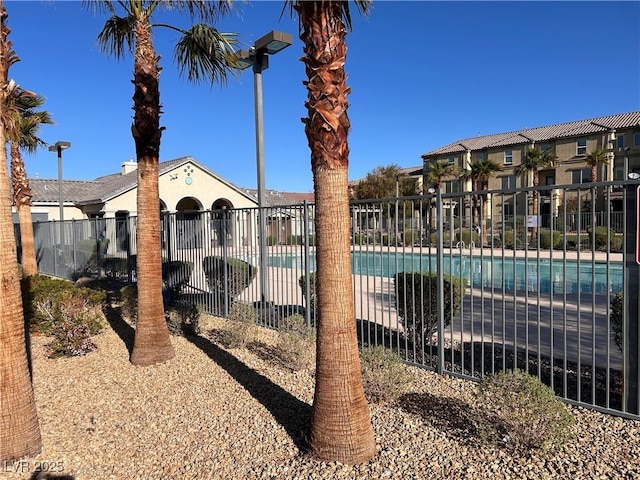community pool with fence