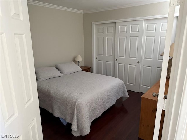 2796 Cape Hope Way, Las Vegas, NV 89121 - bedroom with dark wood-style floors, ornamental molding, and a closet