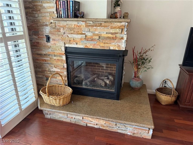 2796 Cape Hope Way, Las Vegas, NV 89121 - detailed view of wood finished floors and a stone fireplace