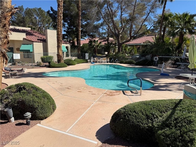 2796 Cape Hope Way, Las Vegas, NV 89121 - community pool with a patio and fence