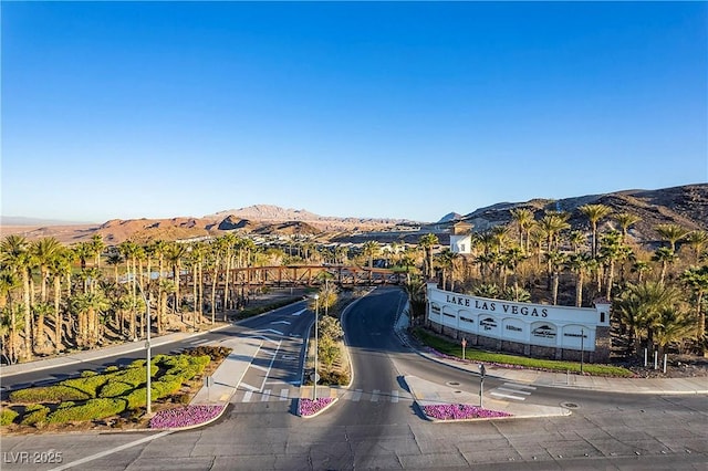 30 Strada Di Villaggio 409, Henderson, NV 89011 - view of road with sidewalks, curbs, and a mountain view