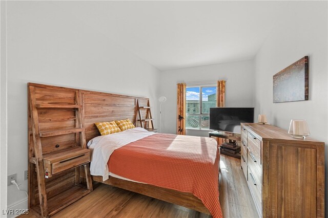 30 Strada Di Villaggio 409, Henderson, NV 89011 - bedroom with light wood-style flooring