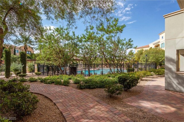 30 Strada Di Villaggio 409, Henderson, NV 89011 - community pool with a patio and fence