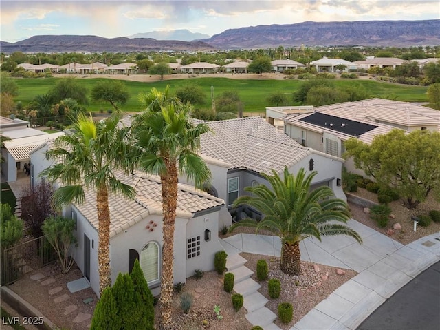 birds eye view of property featuring a residential view and a mountain view