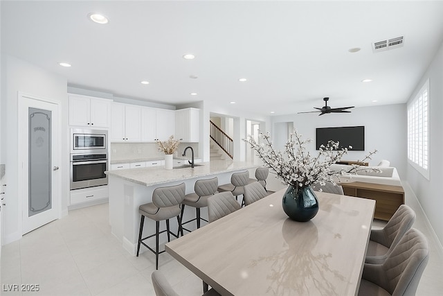 8429 Brackenfield Ave, Las Vegas, NV 89178 - dining space with recessed lighting, light tile patterned floors, and a ceiling fan
