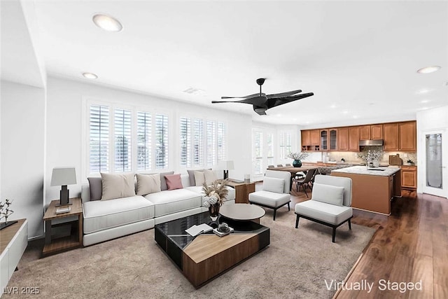 8429 Brackenfield Ave, Las Vegas, NV 89178 - living room with recessed lighting, a ceiling fan, and dark wood-style flooring