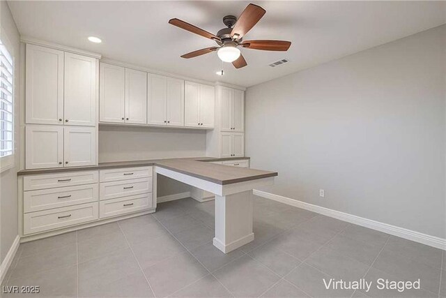 8429 Brackenfield Ave, Las Vegas, NV 89178 - unfurnished office featuring built in study area, a ceiling fan, baseboards, recessed lighting, and light tile patterned flooring