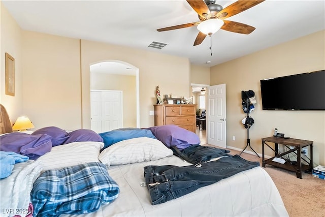 2612 Tullamore Creek Ln, Laughlin, NV 89029 - carpeted bedroom featuring arched walkways and ceiling fan