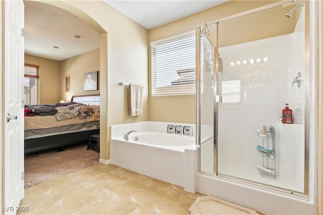 2612 Tullamore Creek Ln, Laughlin, NV 89029 - ensuite bathroom with a stall shower, a garden tub, and tile patterned flooring