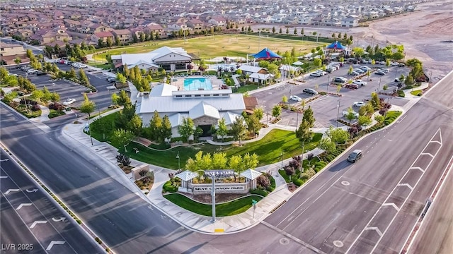 8944 Skye Canyon Ranch St, Las Vegas, NV 89166 - aerial view of property and surrounding area with a pool and nearby suburban area